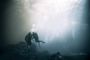Divers at Hoovers Pinnacle. by Chris Mckenna 
